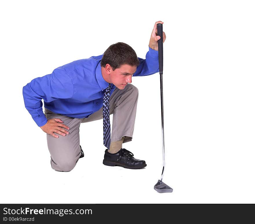 Man with blue shirt aiming over putter . Isolated white background. Man with blue shirt aiming over putter . Isolated white background