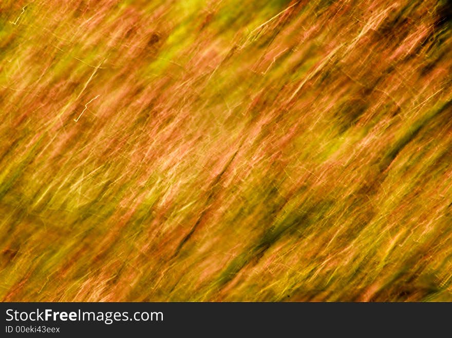 An abstract image created by using a slow shutter speed while moving the lens.  Colors added and adjusted afterwards. An abstract image created by using a slow shutter speed while moving the lens.  Colors added and adjusted afterwards.