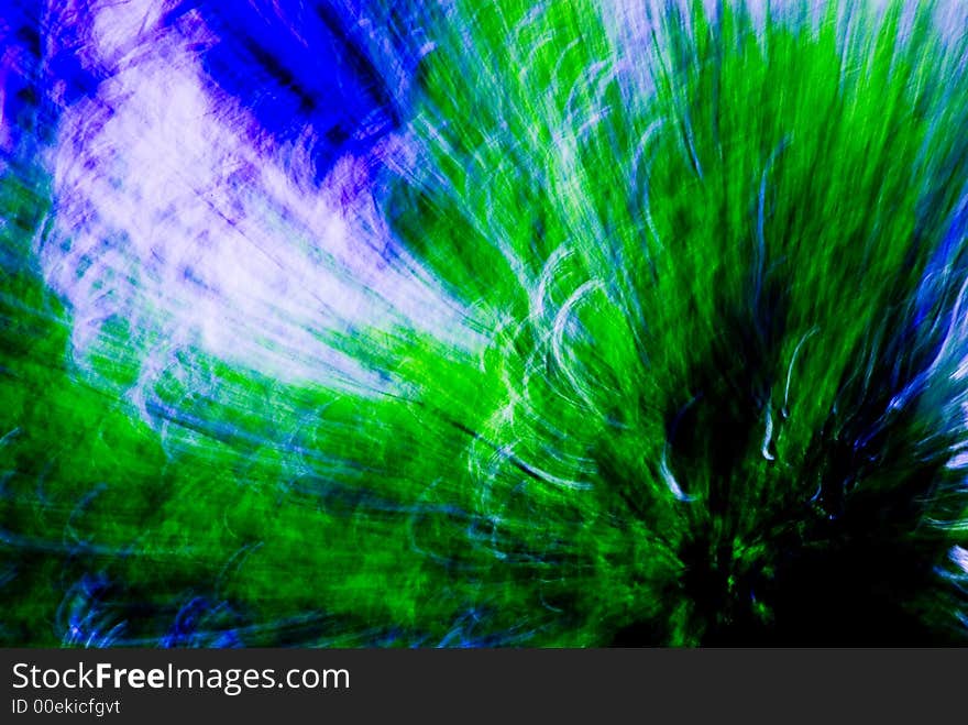 An abstract image created by using a slow shutter speed while moving the lens.  Colors added and adjusted afterwards. An abstract image created by using a slow shutter speed while moving the lens.  Colors added and adjusted afterwards.