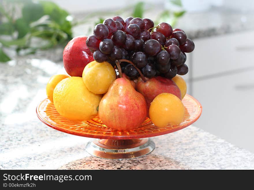 Fruits assortment isolated on the table. Fruits assortment isolated on the table