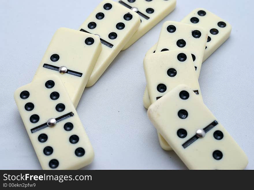 Set of Dominos set up on a white background. Set of Dominos set up on a white background