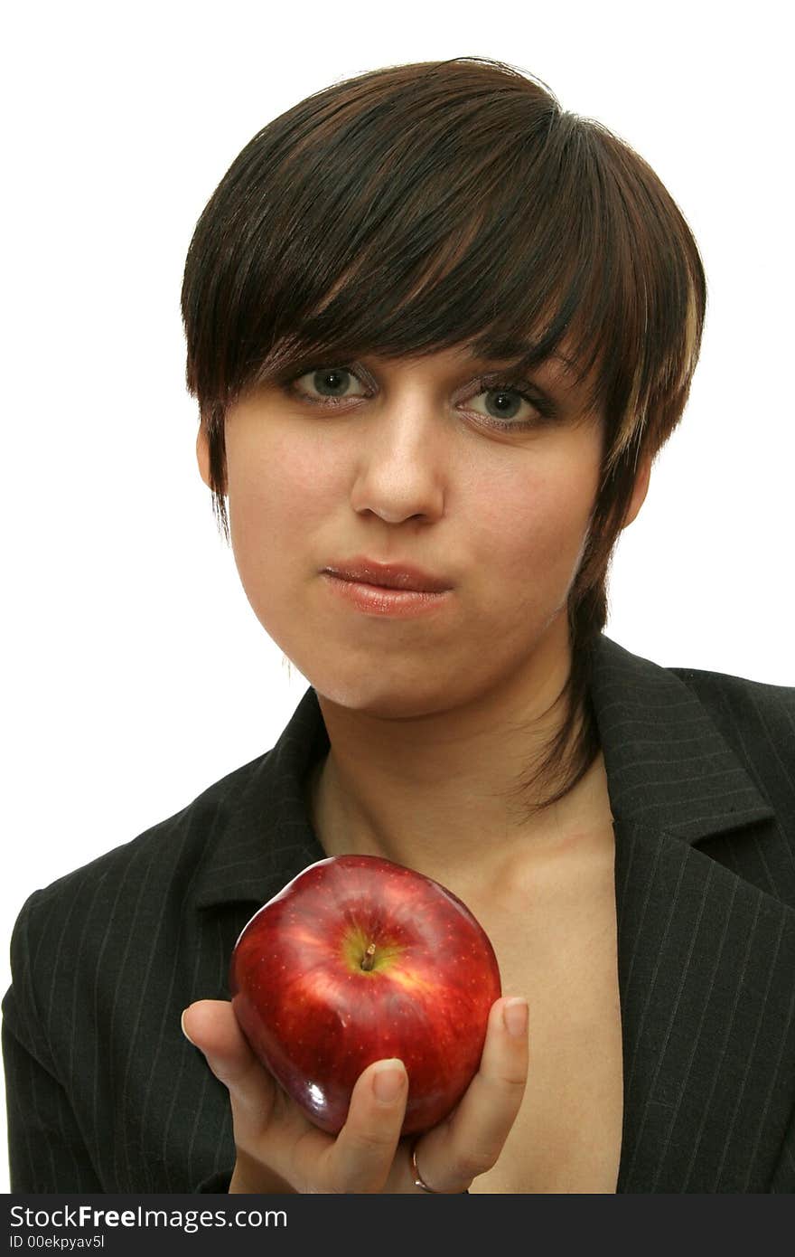 The young girl with a red apple, isolated on white. The young girl with a red apple, isolated on white