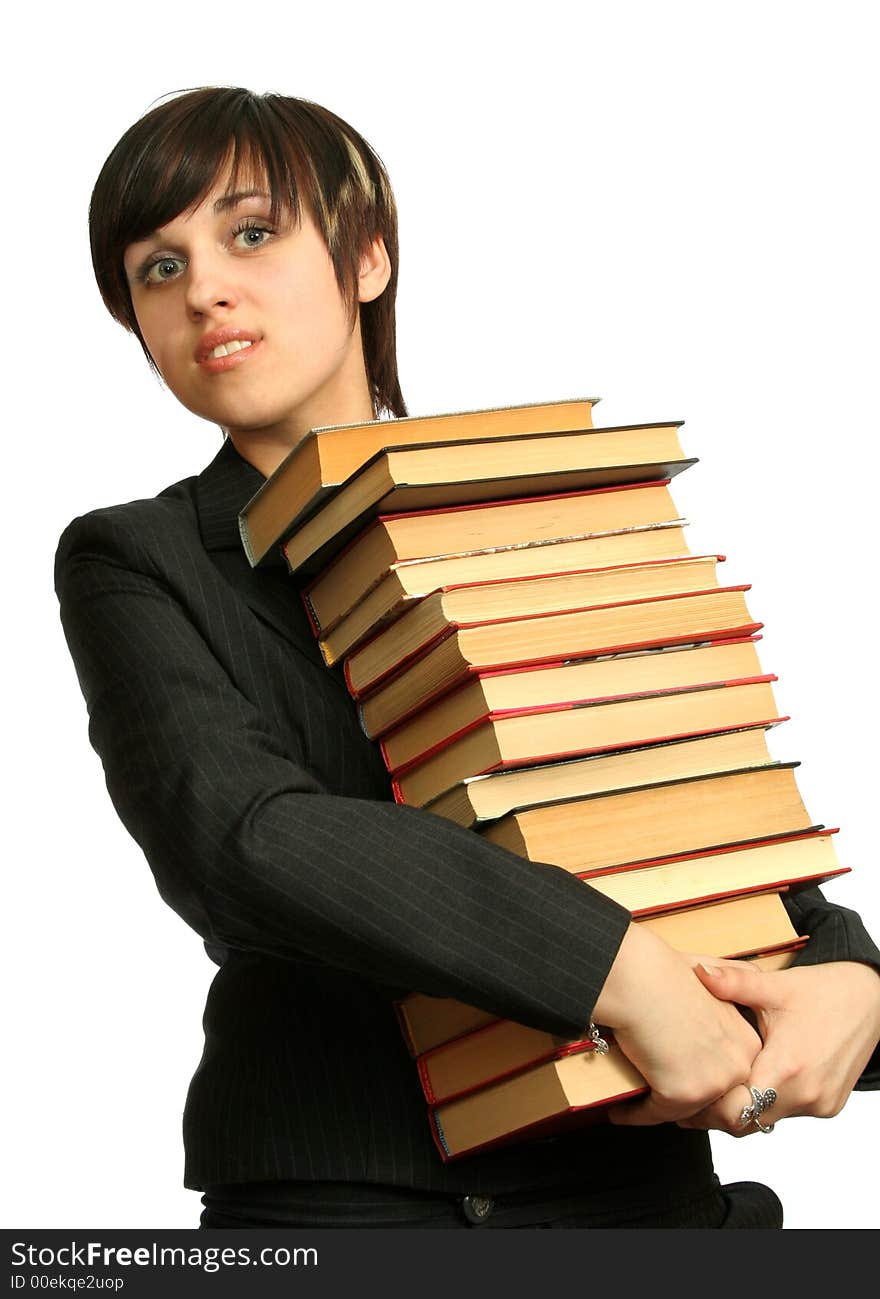 The young smiling girl with books, isolated on white. The young smiling girl with books, isolated on white