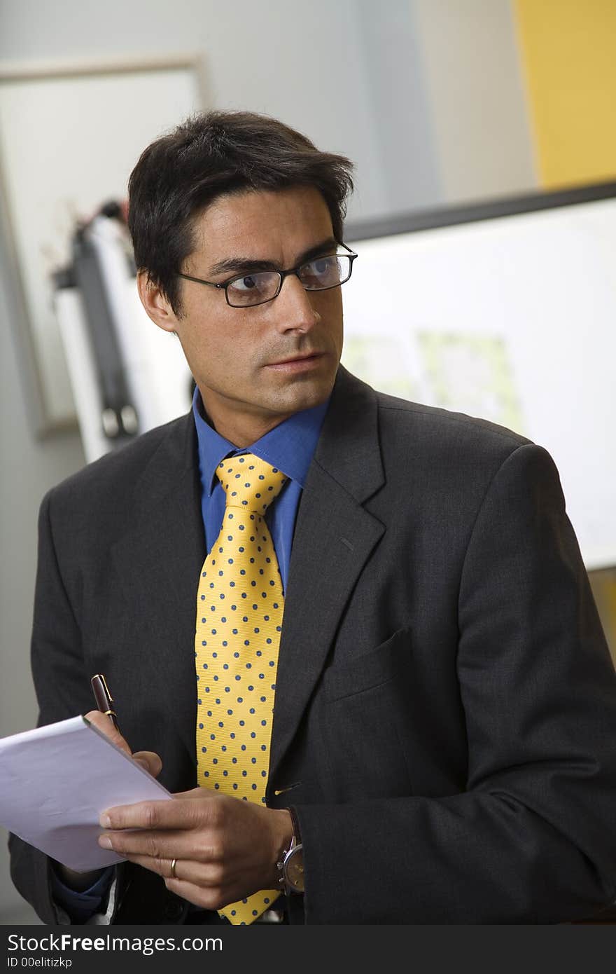 Work place: successful businessman taking some notes. Work place: successful businessman taking some notes