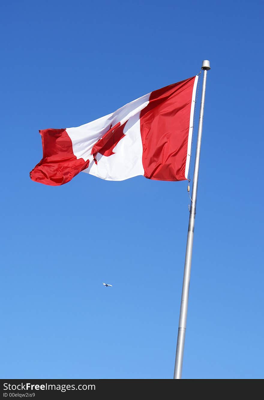 Photo of canada's flag waiving froud on the air