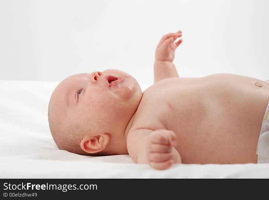 Sweet girl lying on white background. Sweet girl lying on white background