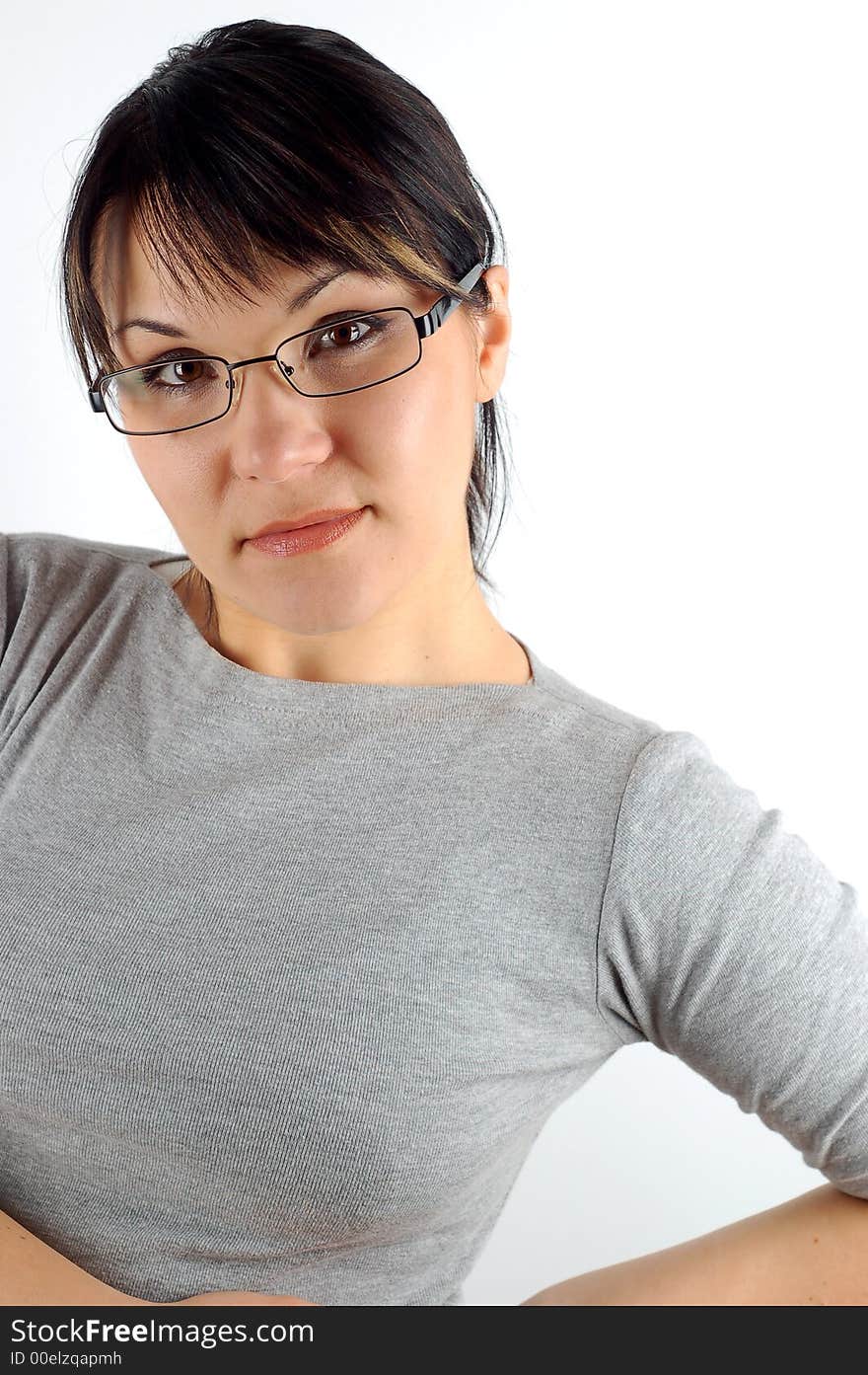 Brunette woman with glasses on white background. Brunette woman with glasses on white background