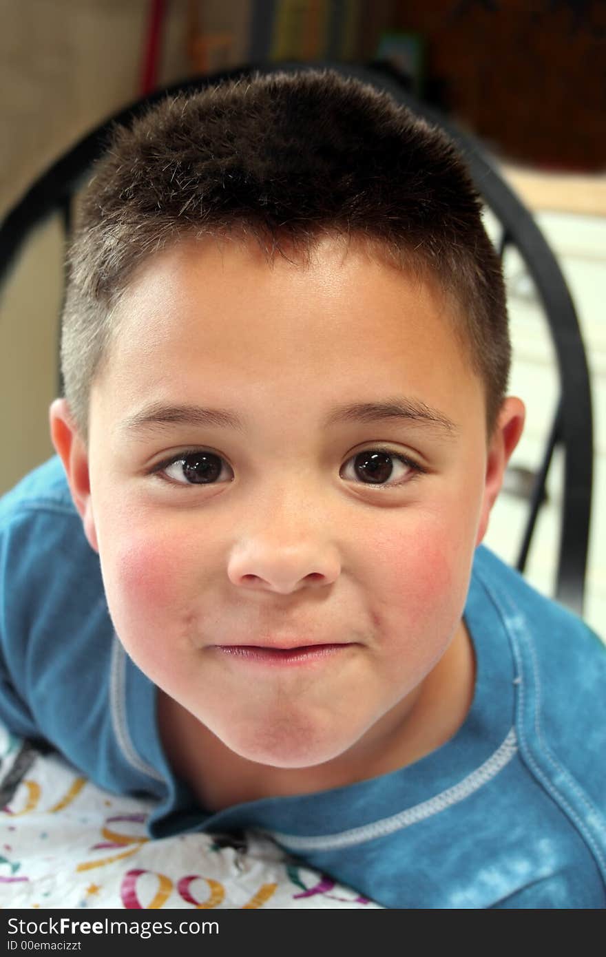 Little boy making face at camera