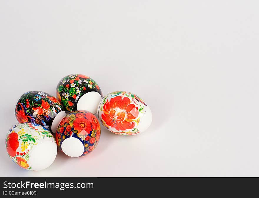 Multi-coloured easter eggs on a white background