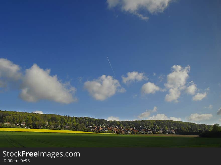 Summer landscape under blue sky