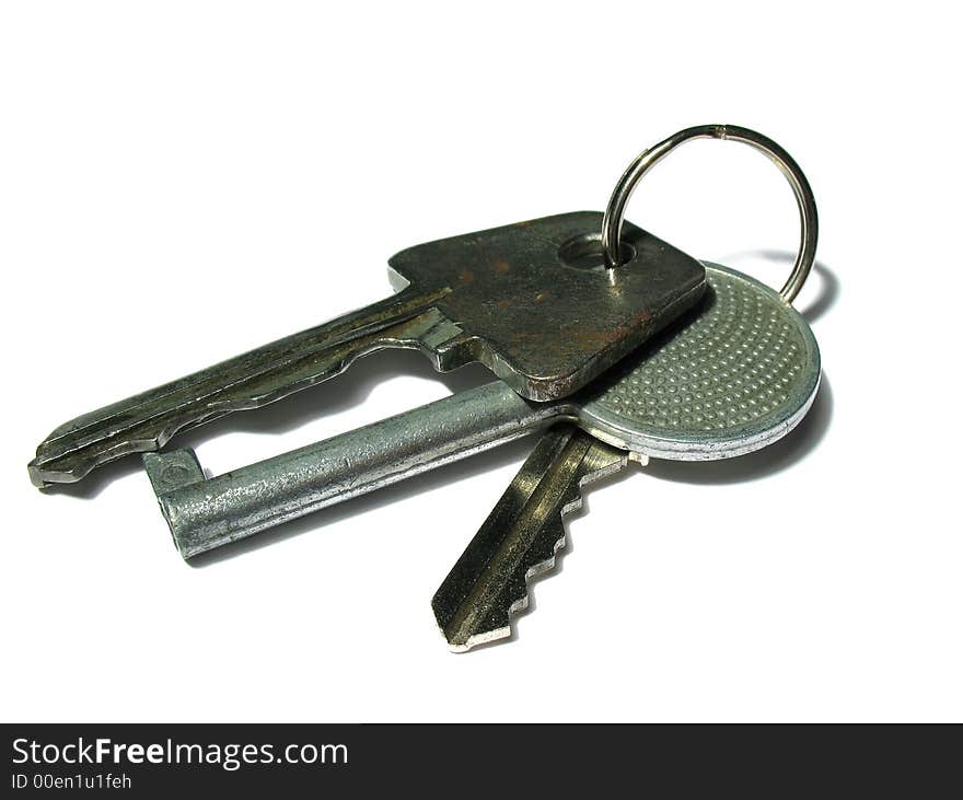 Bunch of old keys isolated on white.