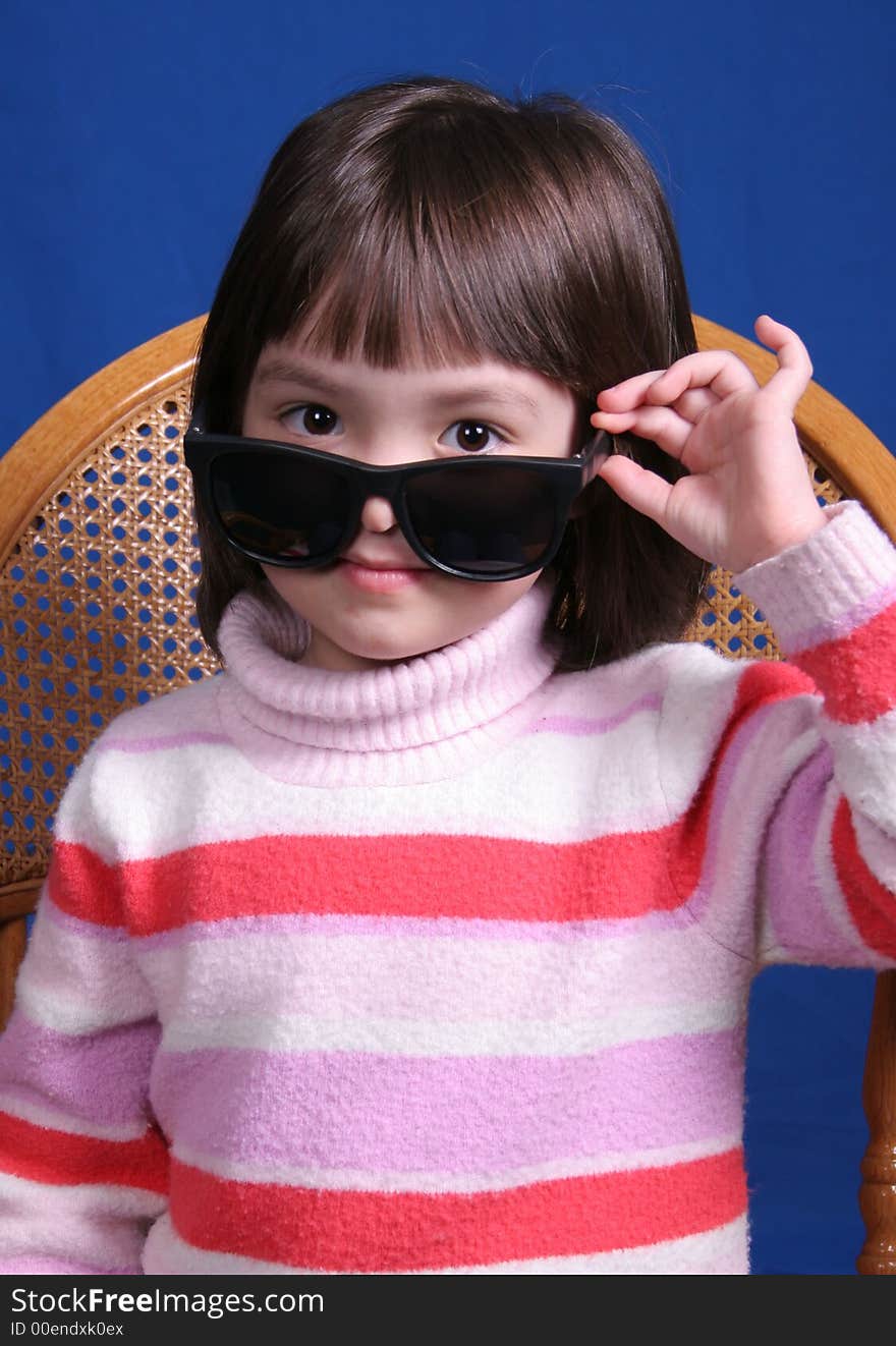 Little girl with sunglasses