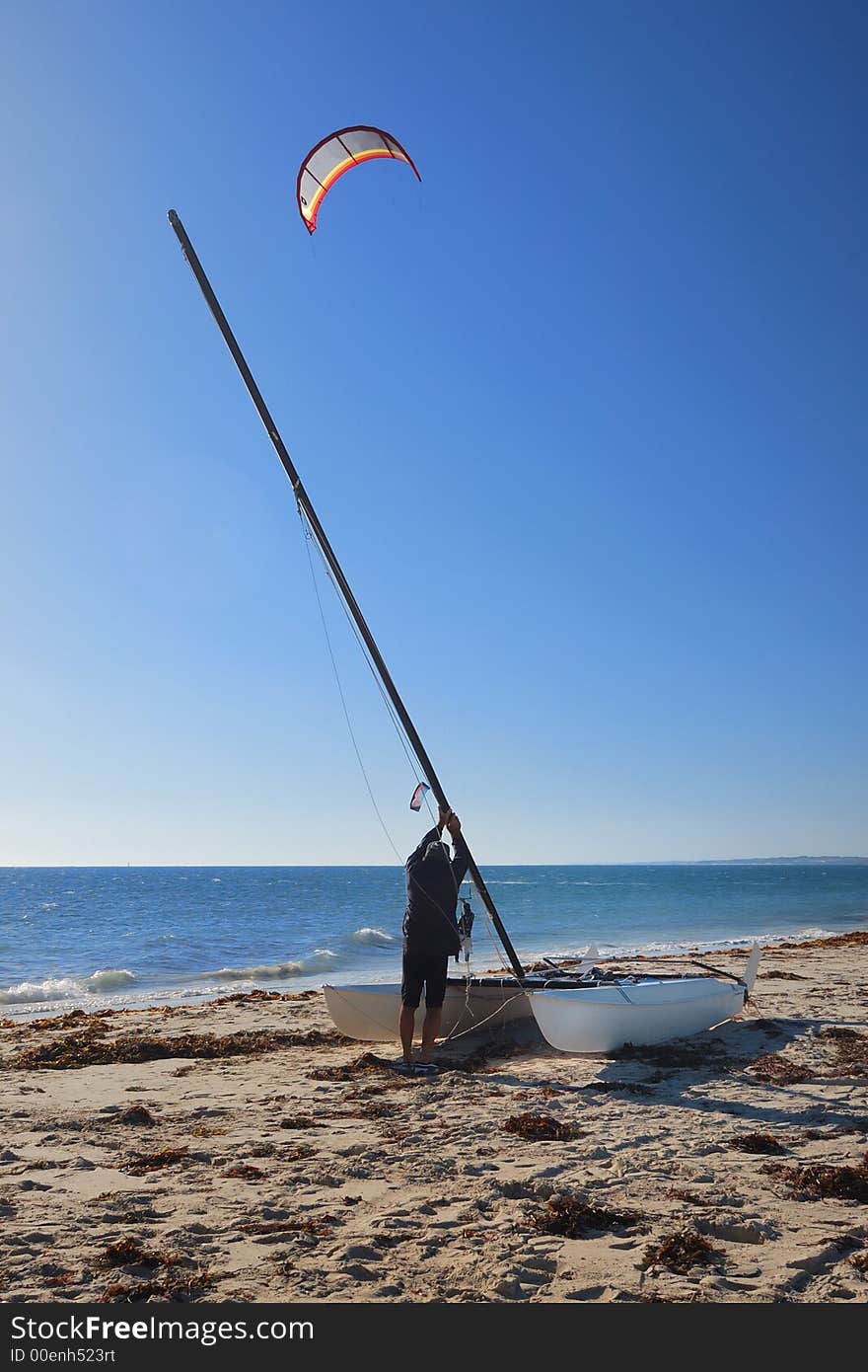 Catermaran sailor on a beach in Perth Western Australia. Catermaran sailor on a beach in Perth Western Australia