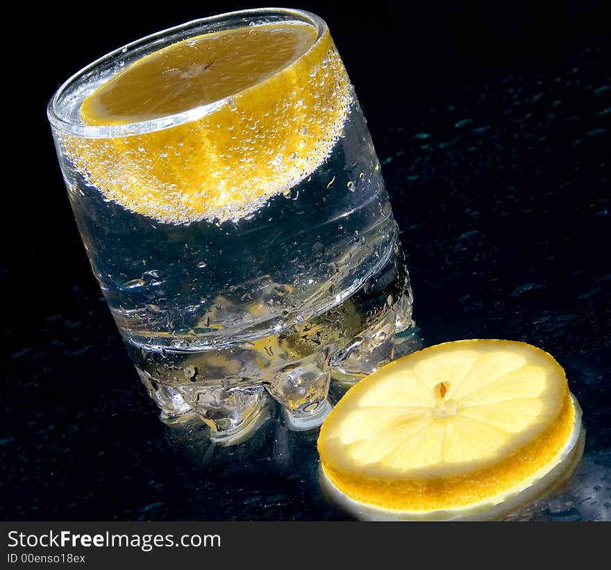 Glass of water with a lemon