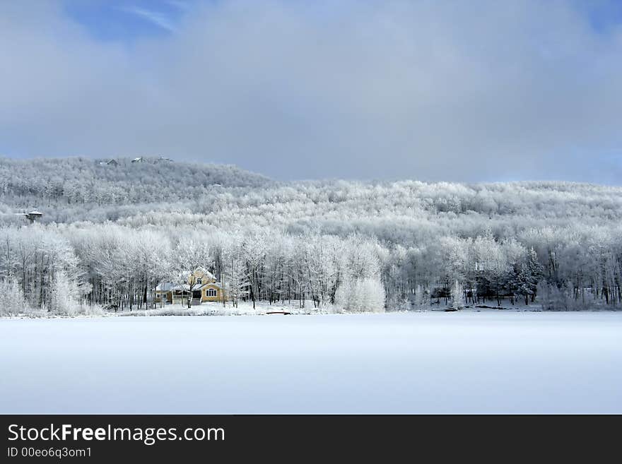 A perfect place to relax, near a frozen lake, lost in the woods. A perfect place to relax, near a frozen lake, lost in the woods