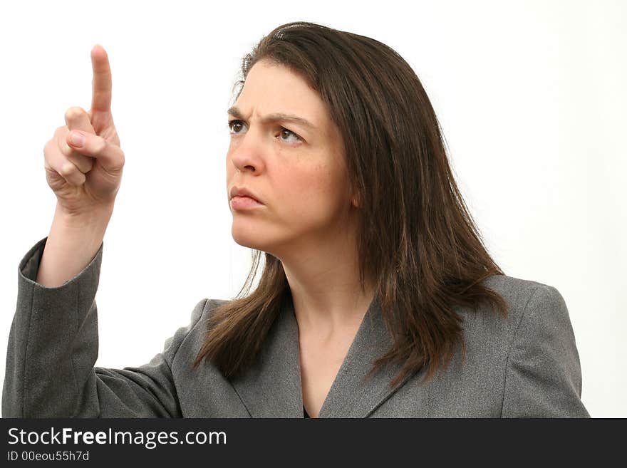 Frowning business woman with pointing finger