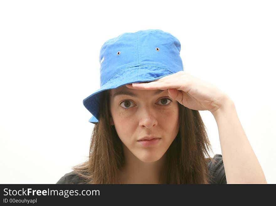 Young woman isolated over white background wearing a hat