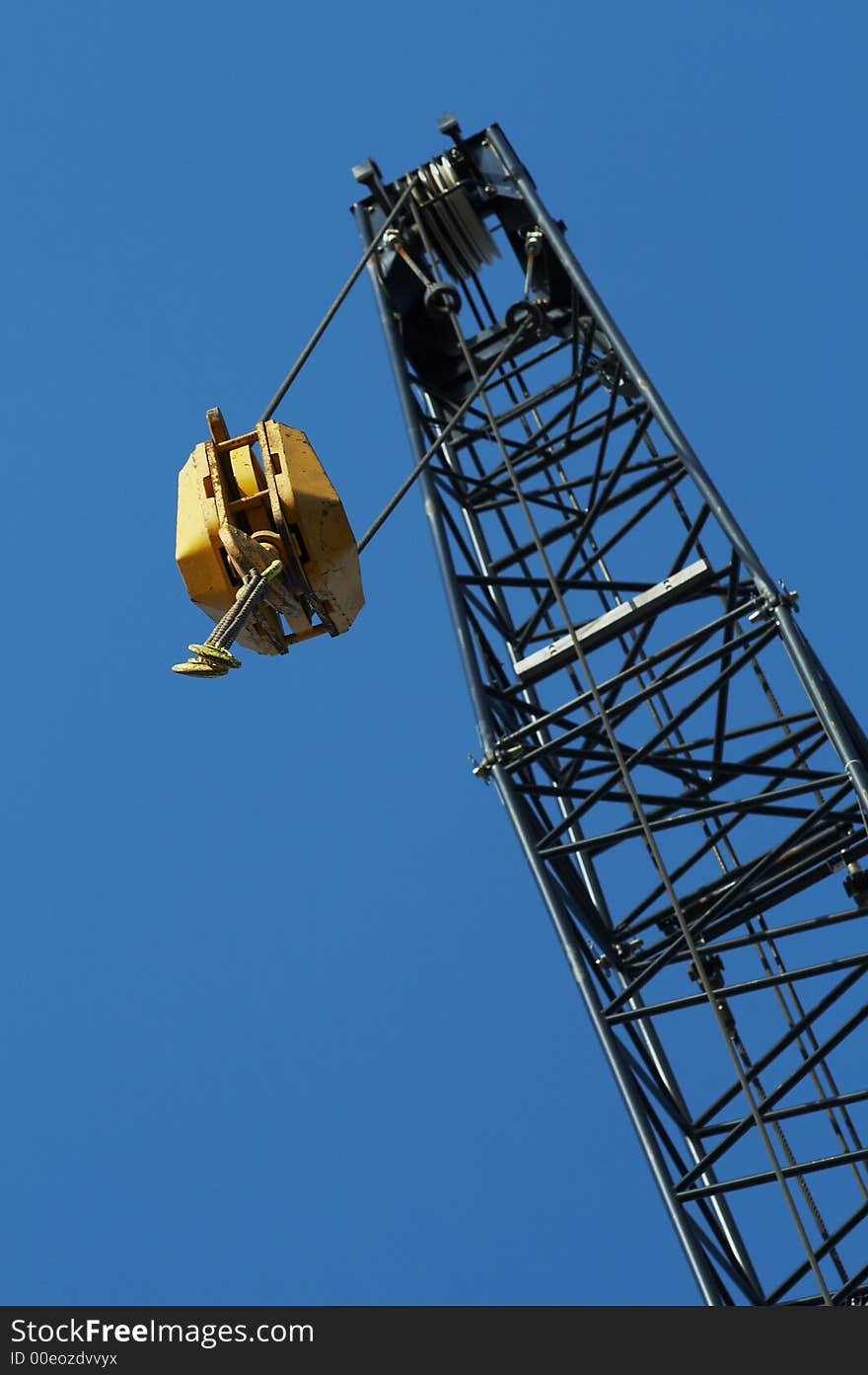 Big crane boom in blue sky. Big crane boom in blue sky