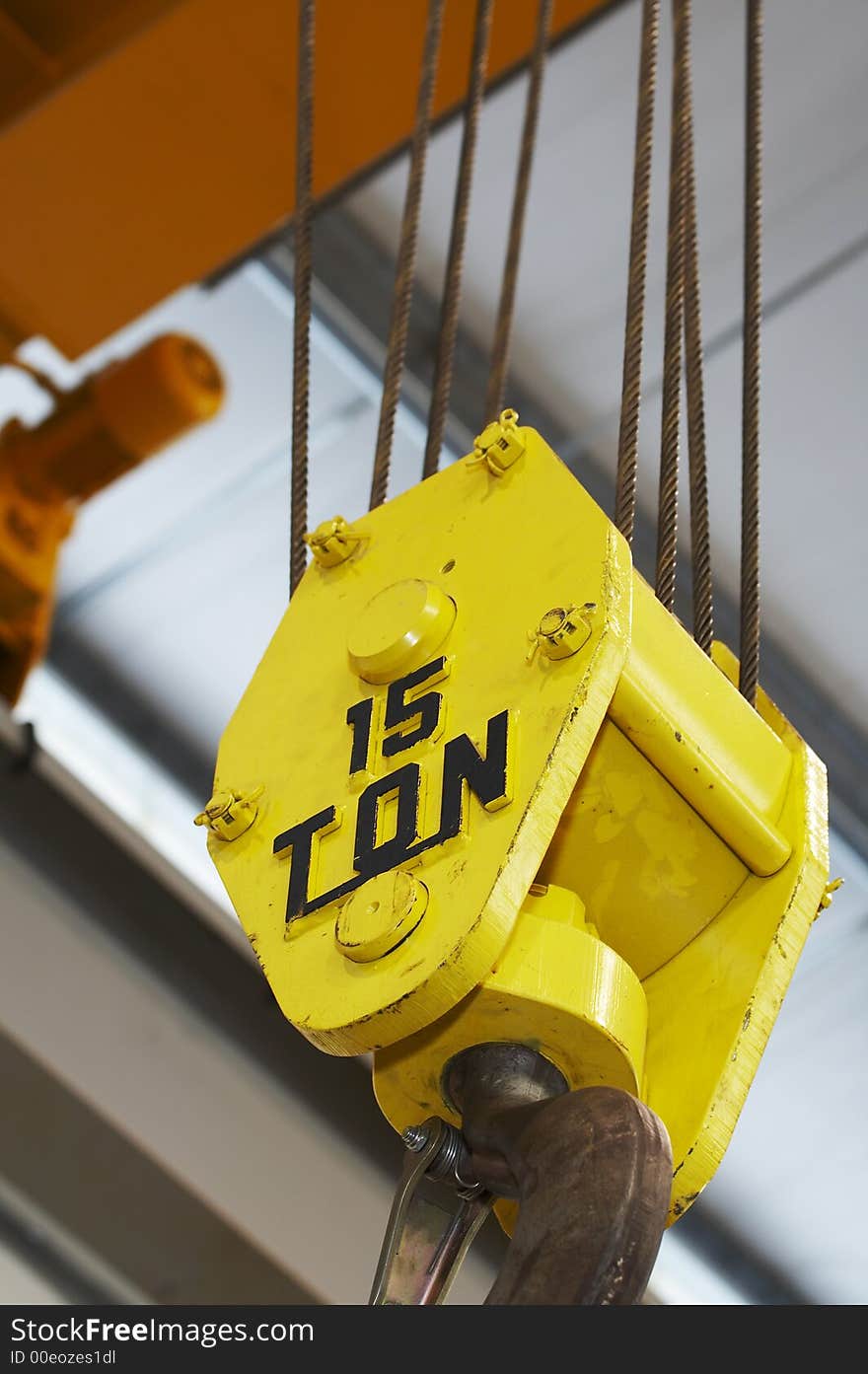 Yellow over head lift in building. Yellow over head lift in building