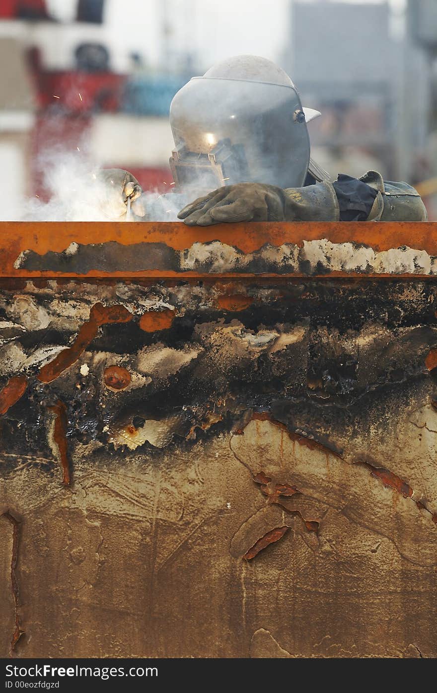 One welder working on steel project. One welder working on steel project