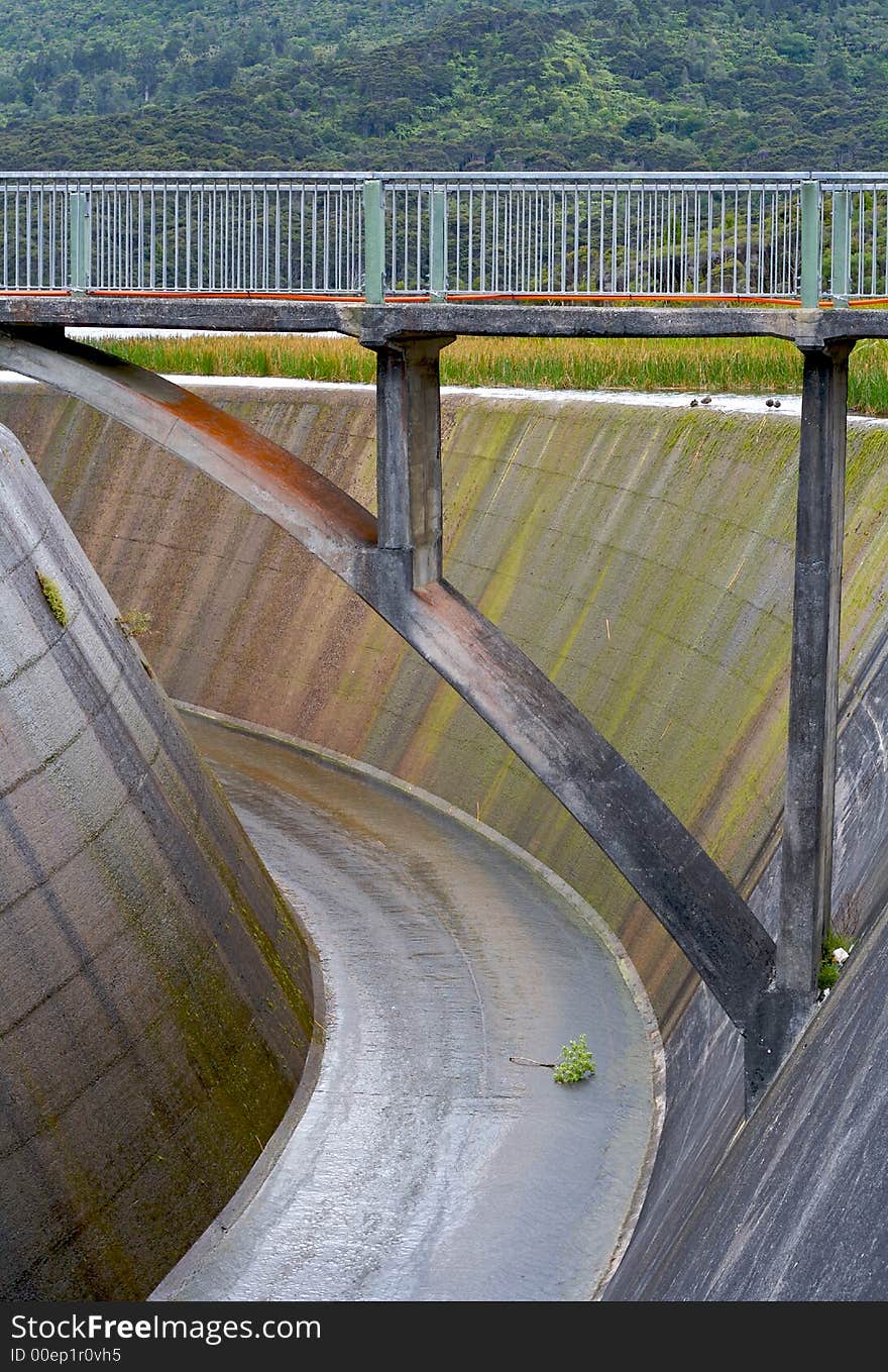 A bridge over a dam spillway.