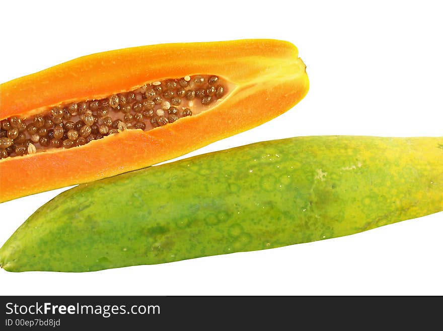 Cut papaya fruit showing seeds