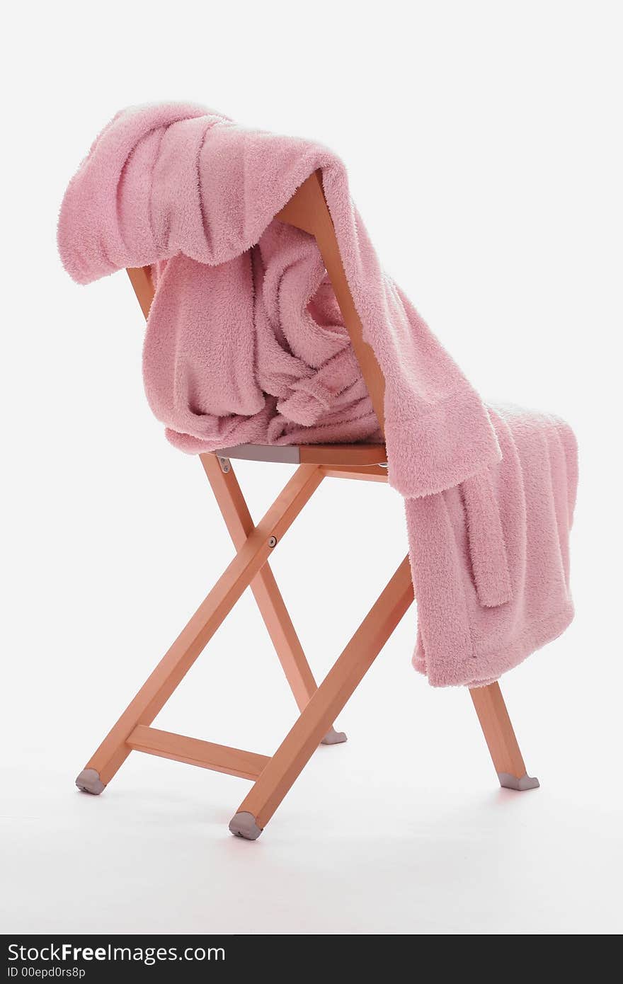 Dressing-gown is on the chair