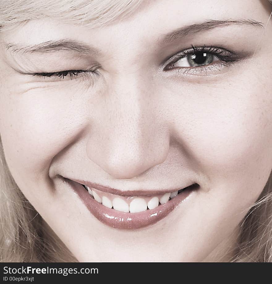 Pretty young smiling woman. Close up. Pretty young smiling woman. Close up.