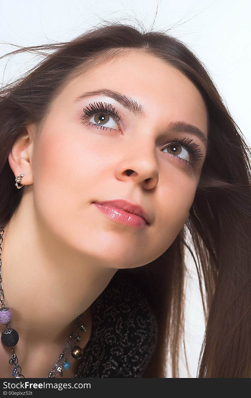 Portrait of young beautiful woman with long hair