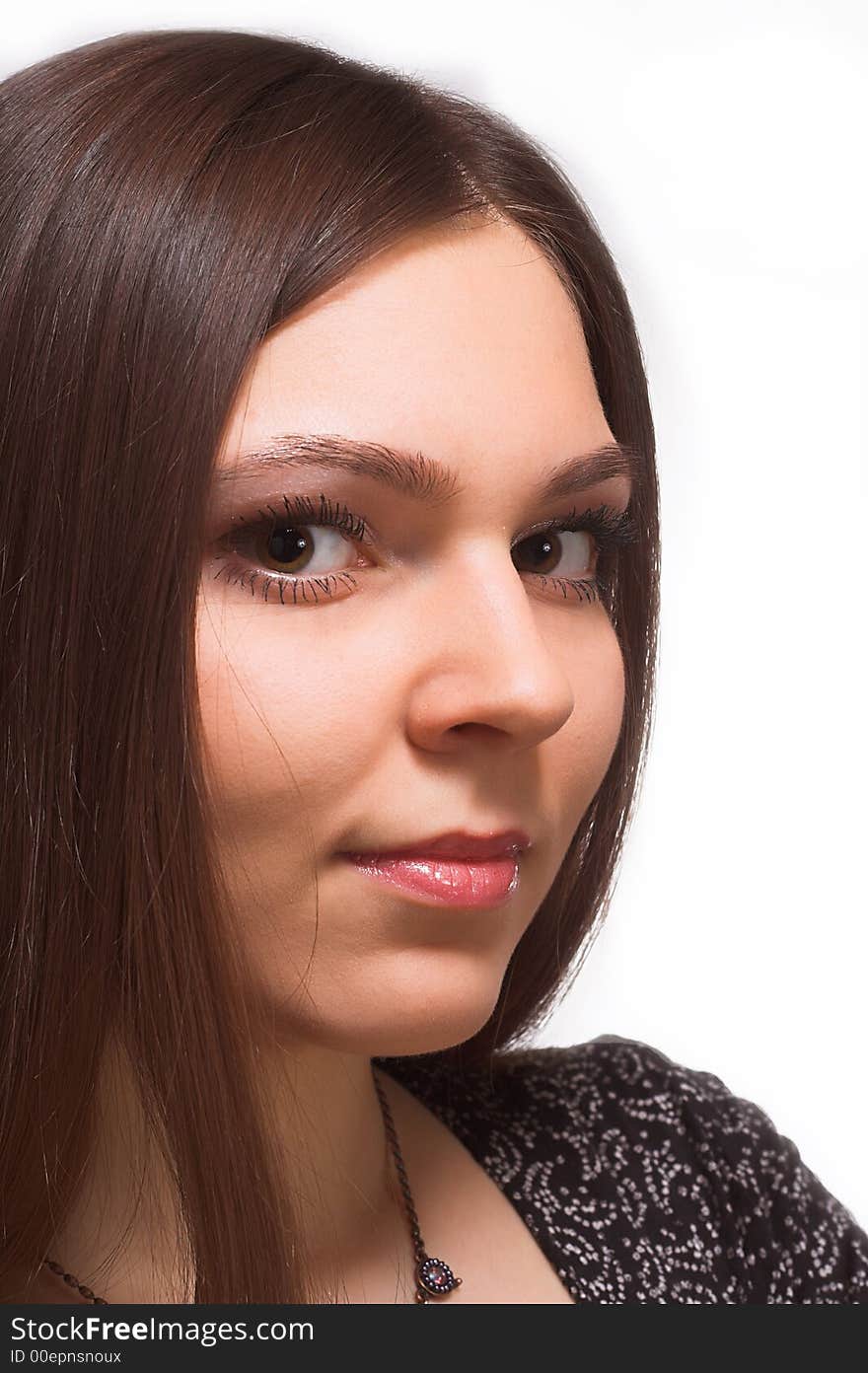 Portrait of young beautiful woman with long hair