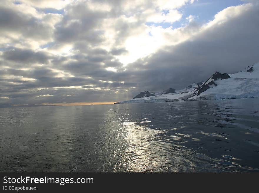 Antarctica sunset in a calm day