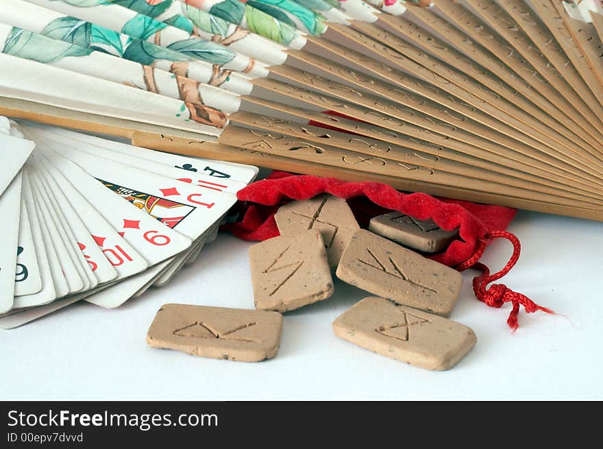 Fortune Teller's runes and cards with old flabellum