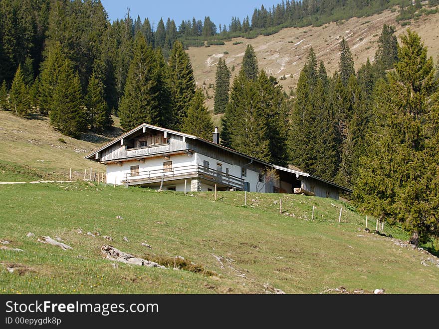 White bavarian house in the Alps