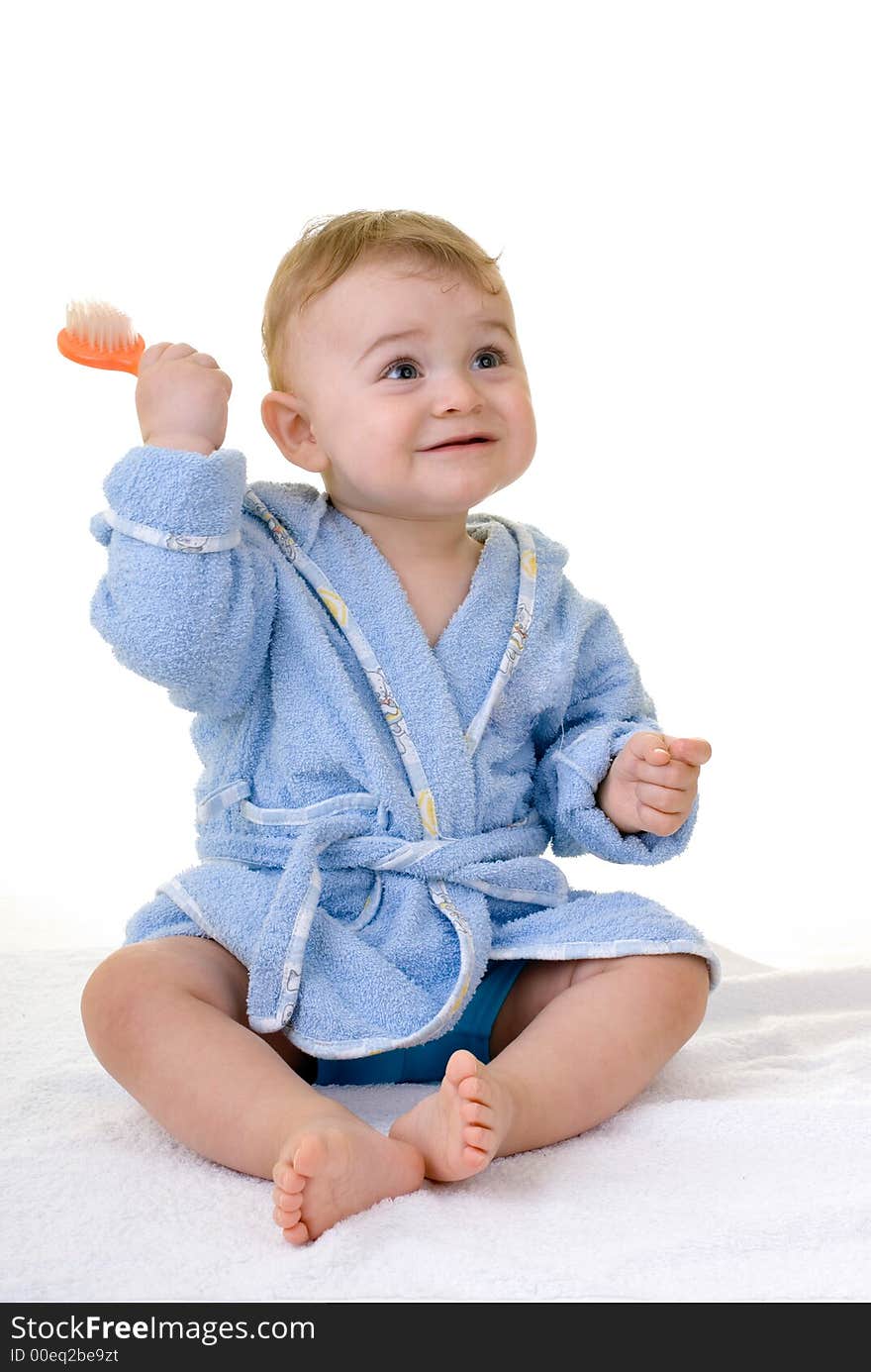 Baby playing with his hairbrush. Baby playing with his hairbrush