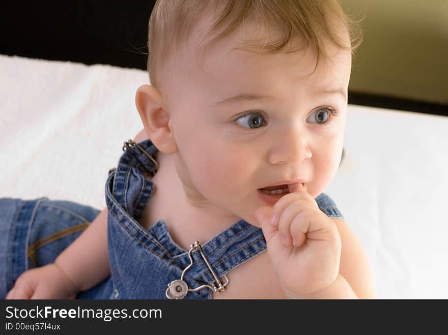 Portrait of a baby who is wondering. Portrait of a baby who is wondering