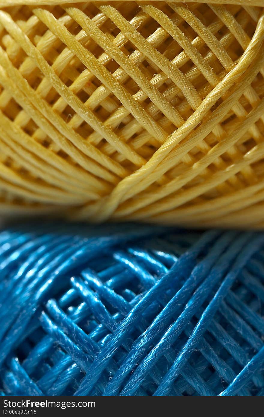Close up of yellow and blue string