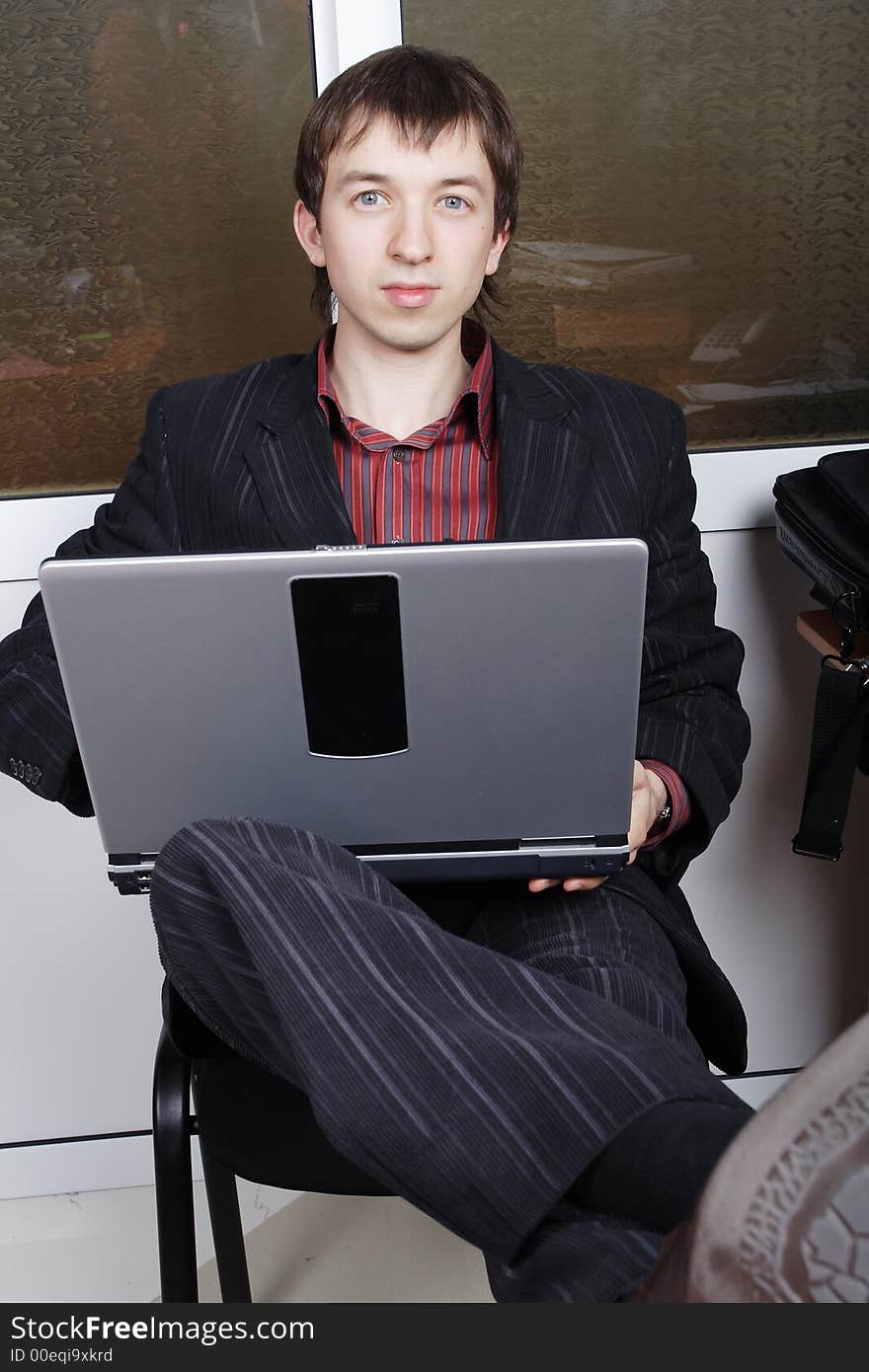 Portrait of a businessman in a working process. Portrait of a businessman in a working process