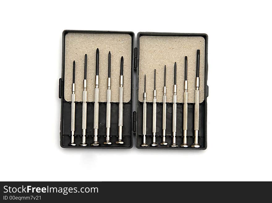 A set of precision screw drivers in a toolbox. A set of precision screw drivers in a toolbox