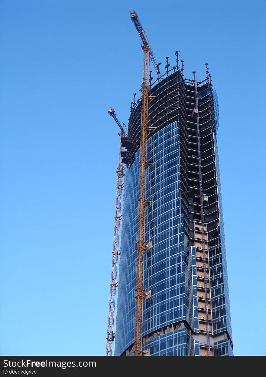 Modern building used for commercial purposes on the blue sky. Modern building used for commercial purposes on the blue sky