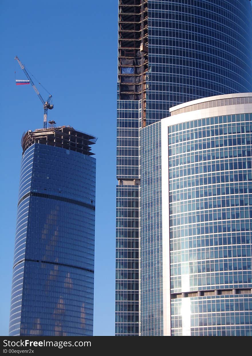 Modern building used for commercial purposes on the blue sky. Modern building used for commercial purposes on the blue sky