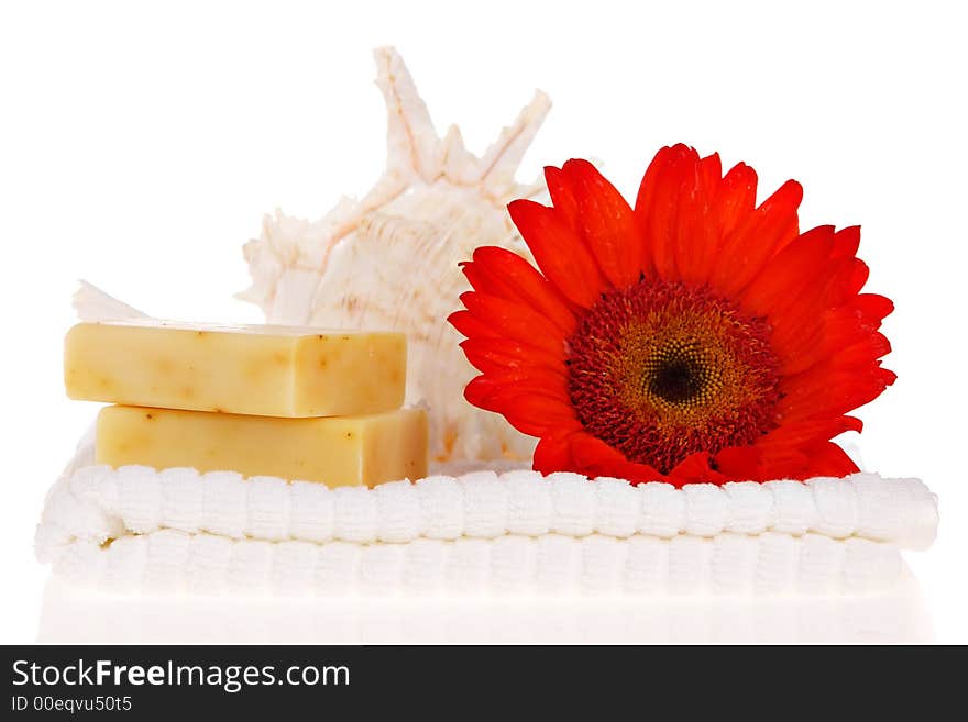 Soap bars, towel, and red flower. Soap bars, towel, and red flower