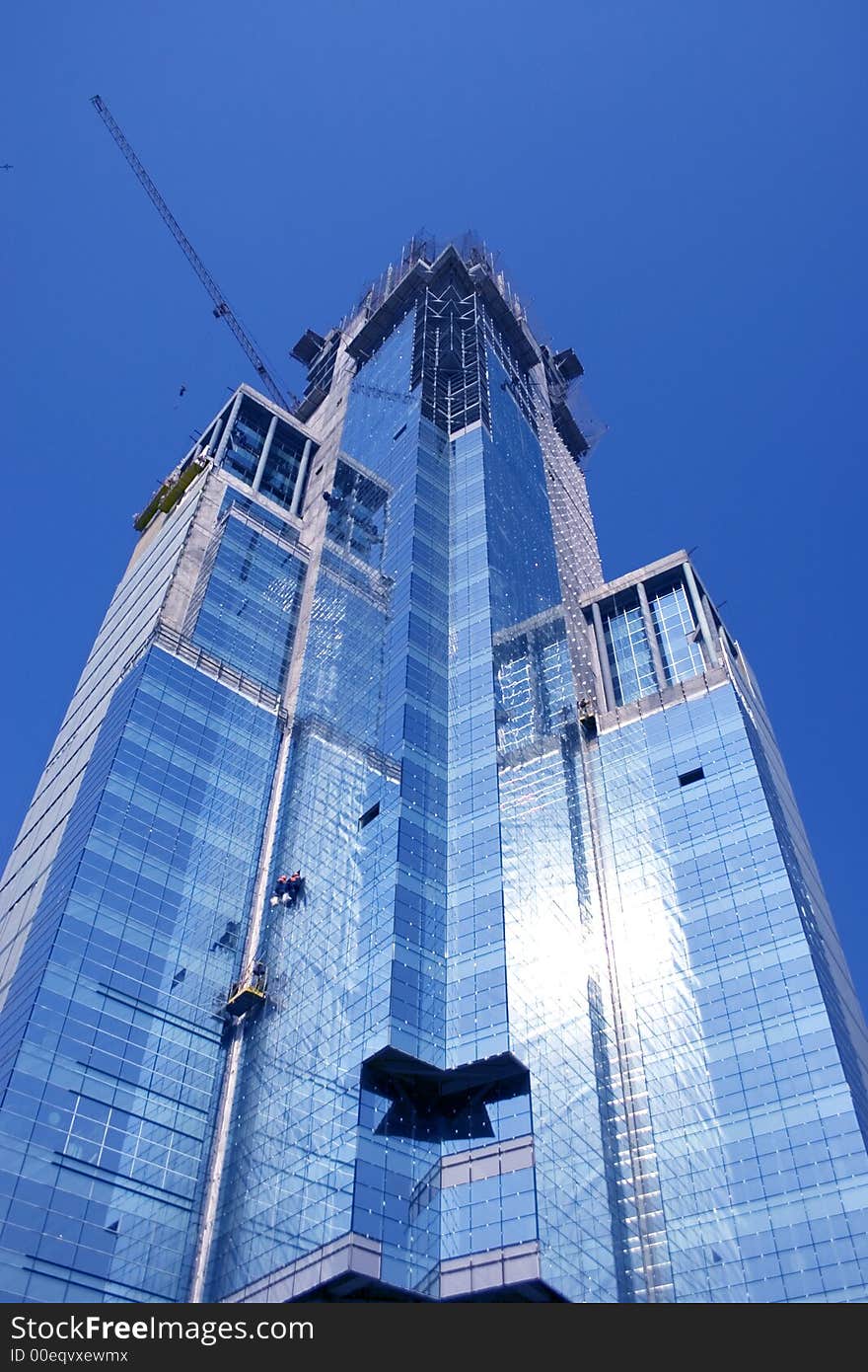 Modern building used for commercial purposes on the blue sky. Modern building used for commercial purposes on the blue sky