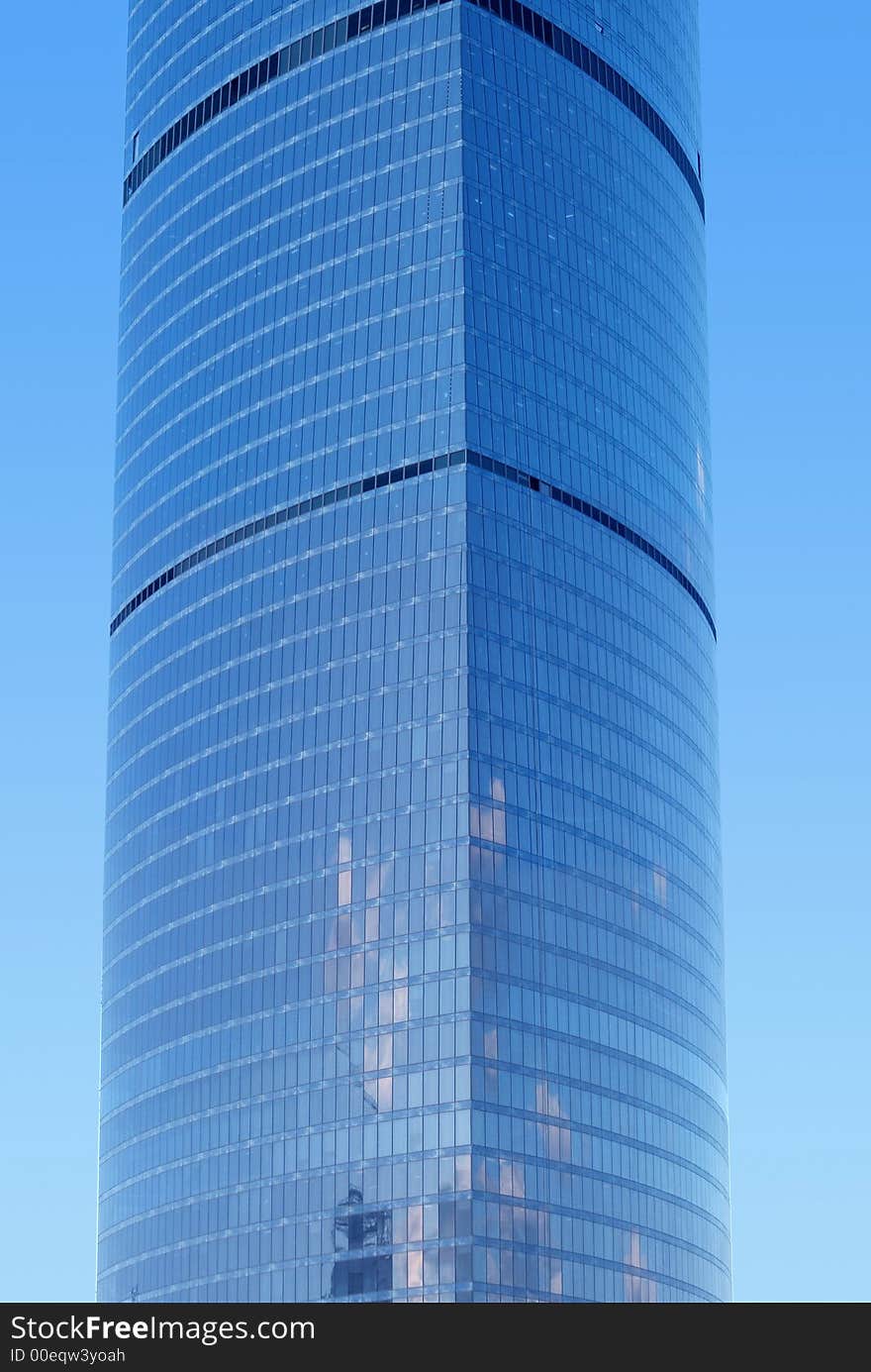 Modern building used for commercial purposes on the blue sky. Modern building used for commercial purposes on the blue sky