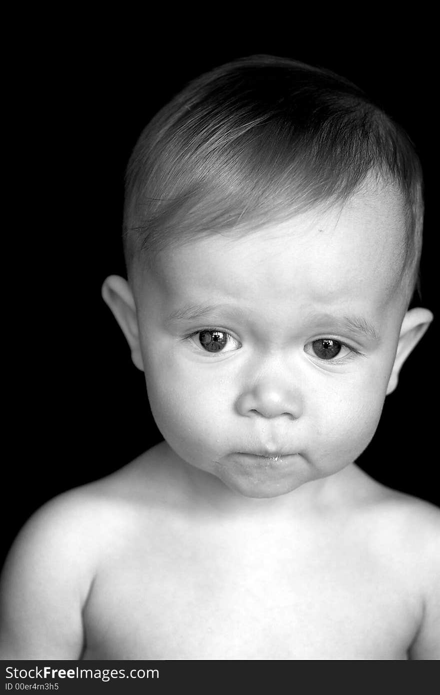 Black and white image of beautiful 11 month old baby boy. Black and white image of beautiful 11 month old baby boy