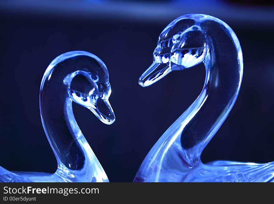 Blue glass swans