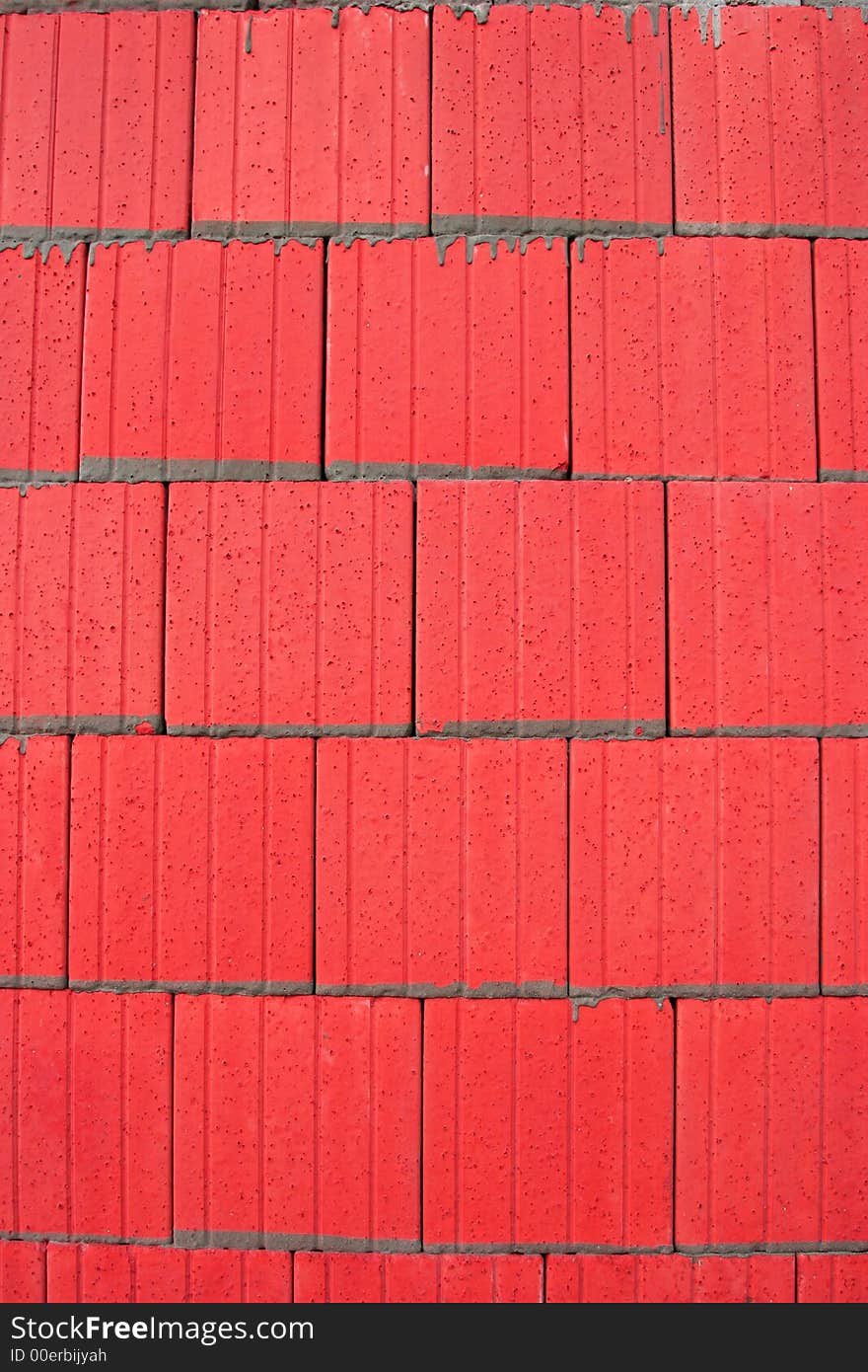 Abstract in red of tiles with grey cement pointing. Abstract in red of tiles with grey cement pointing.