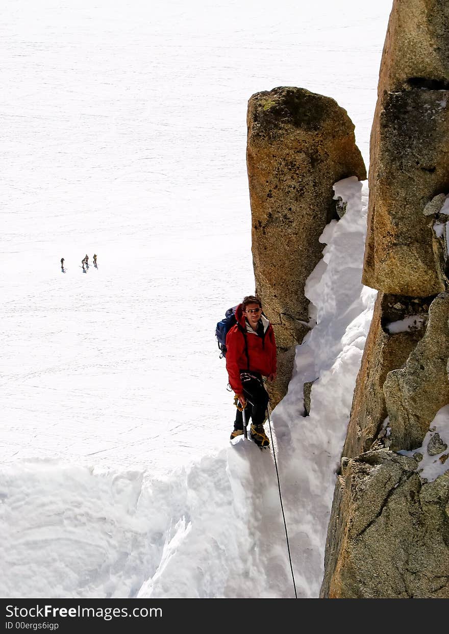 Climber on the Cosmiques ridge, Aiguille du Midi, Chamonix, Mont Blanc, West Alps, France, europe