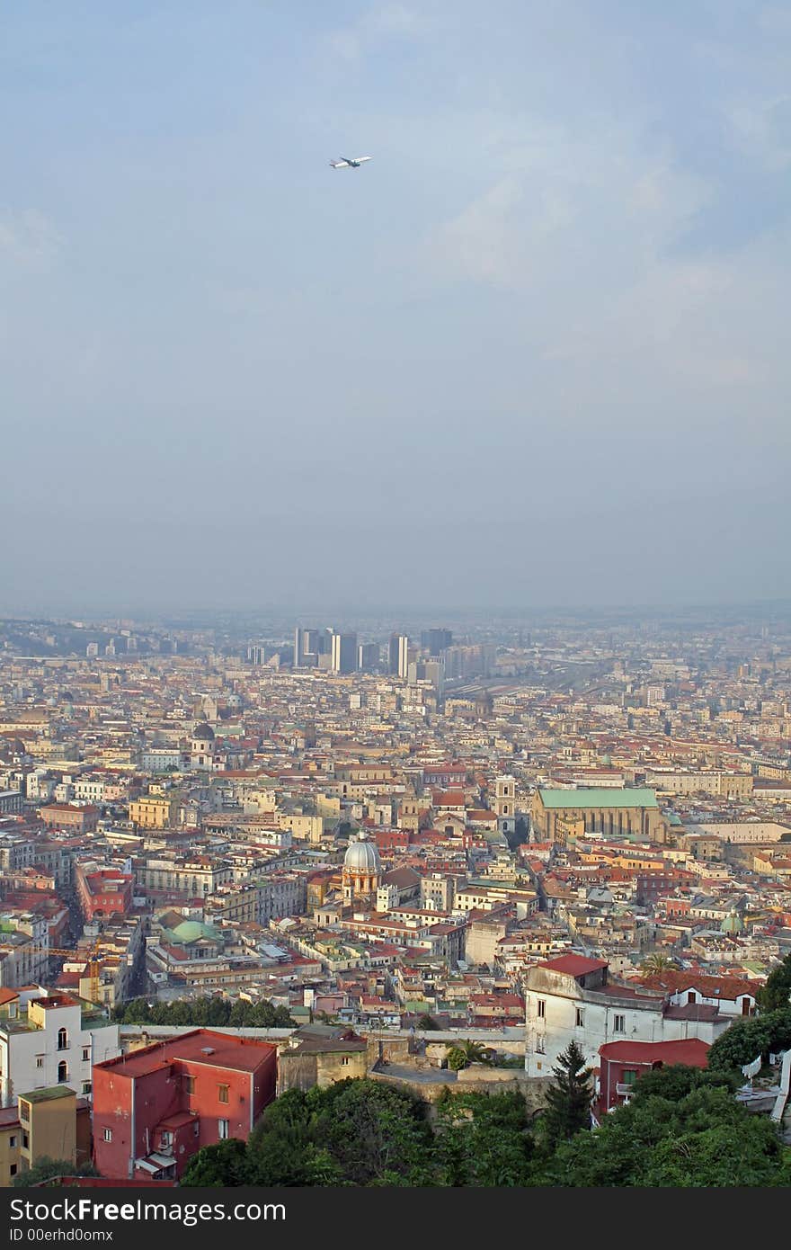 View over the town of naples, campania, italy with starting aircraft. View over the town of naples, campania, italy with starting aircraft