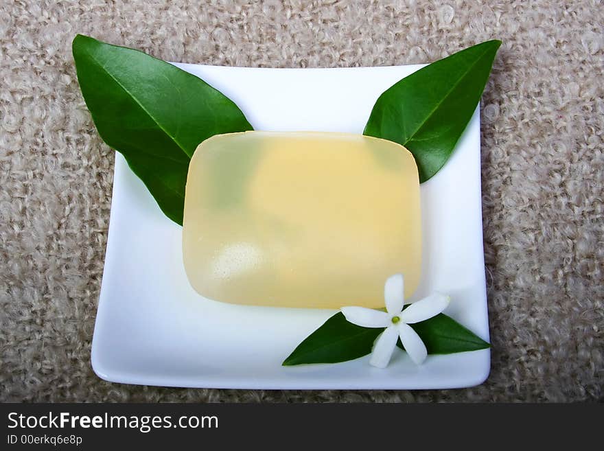 Digital photo of a soap with a flower.