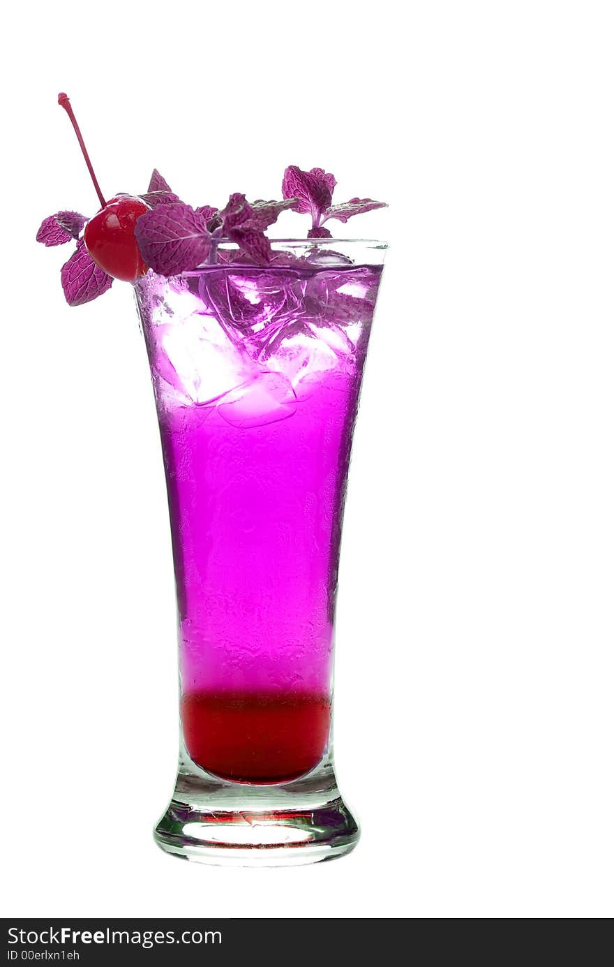 Colorful alcoholic cocktail in a tall glass against white background. Colorful alcoholic cocktail in a tall glass against white background